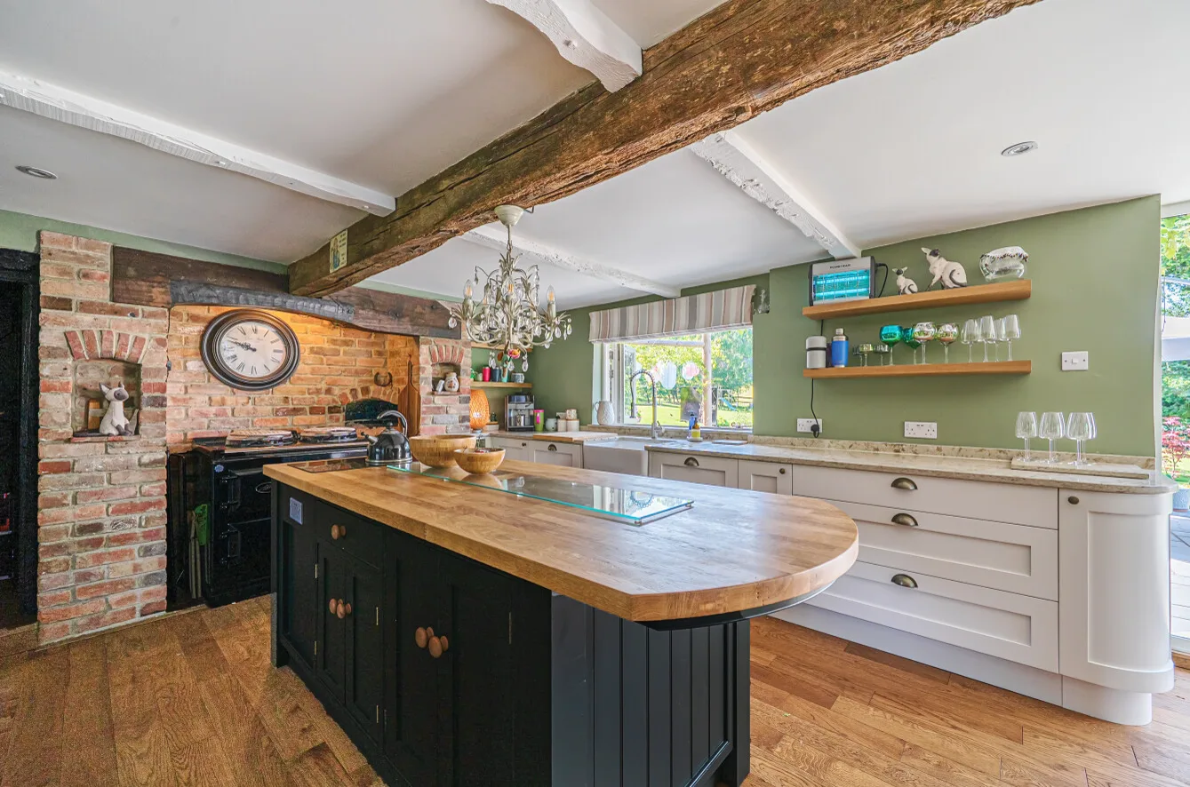The kitchen, brick oven and Aga